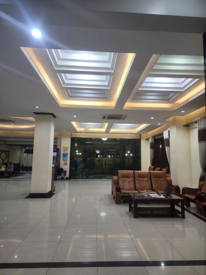 Warm hotel lobby with 24-hour front desk